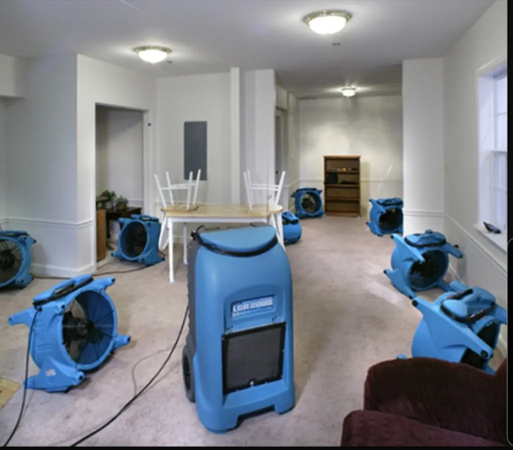 Air movers and dehumidifier setup for Water Damage Restoration in Credit River